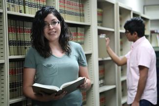 Paralegal student in library